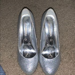 I am selling these size 7 glittery heels ASAP!